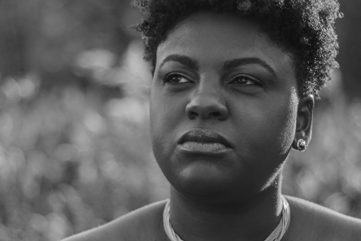 Woman with a contemplative expression, representing slip and fall injury clients