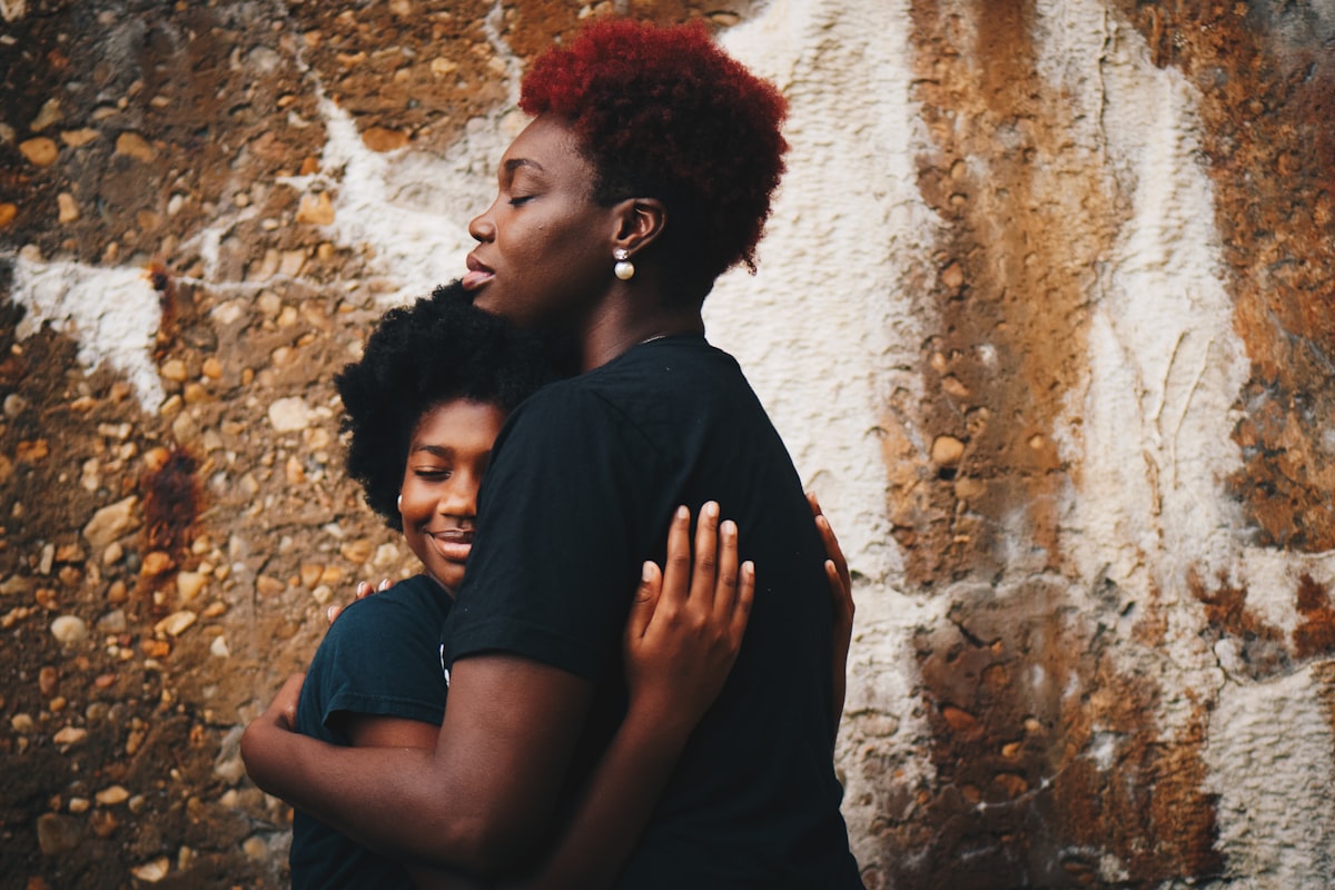 Mother and daughter embracing, representing families seeking justice after wrongful death